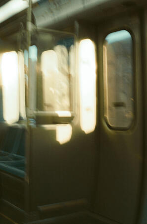 olympus om-pc olympus zuiko mc auto-s 50mm f/1.8 expired kodak ultramax 400 (shot at 100 iso) cta red line train car, il, usa